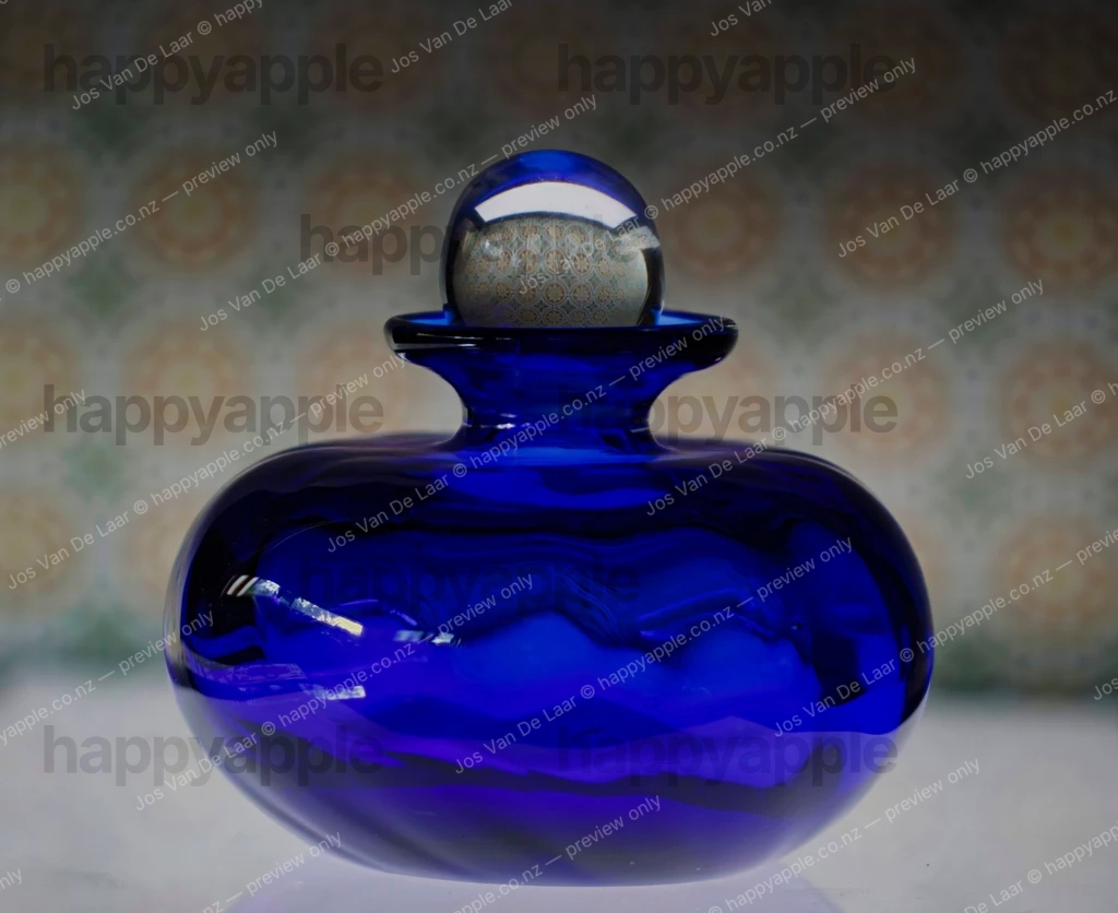 Cobalt Blue Glass Perfume Bottle with Sphere Stopper — Abstract photo by Jos Van De Laar