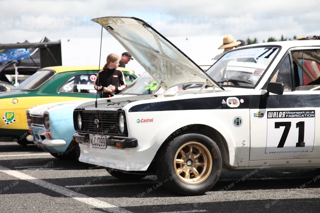 Classic rally car number 71 at a motorsport event paddock — Automotive photo by Jeff Van de Laar